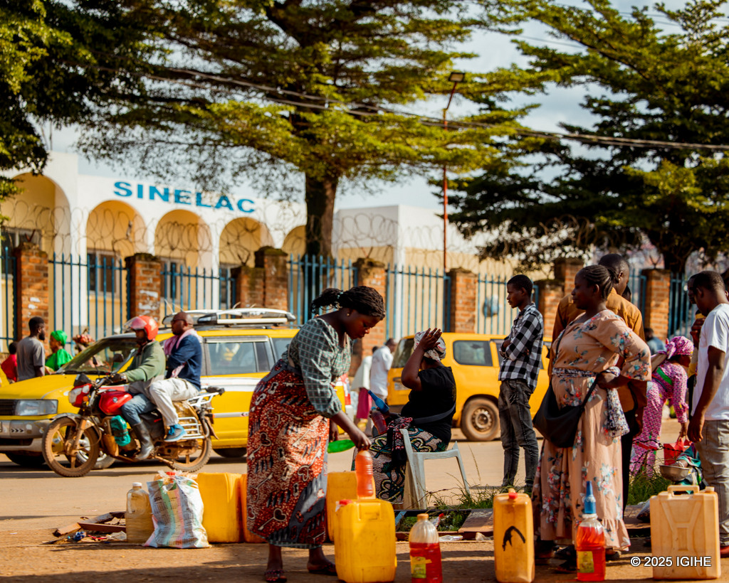 Traders sell fuel in Bukavu as the city slowly roars back to life.