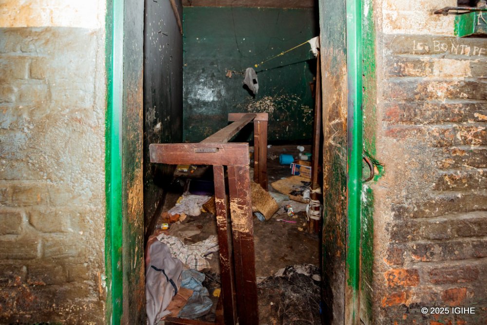 Broken furniture lies in disarray, while overturned beds and shattered wooden frames create a nightmarish scene, straight out of a horror movie.