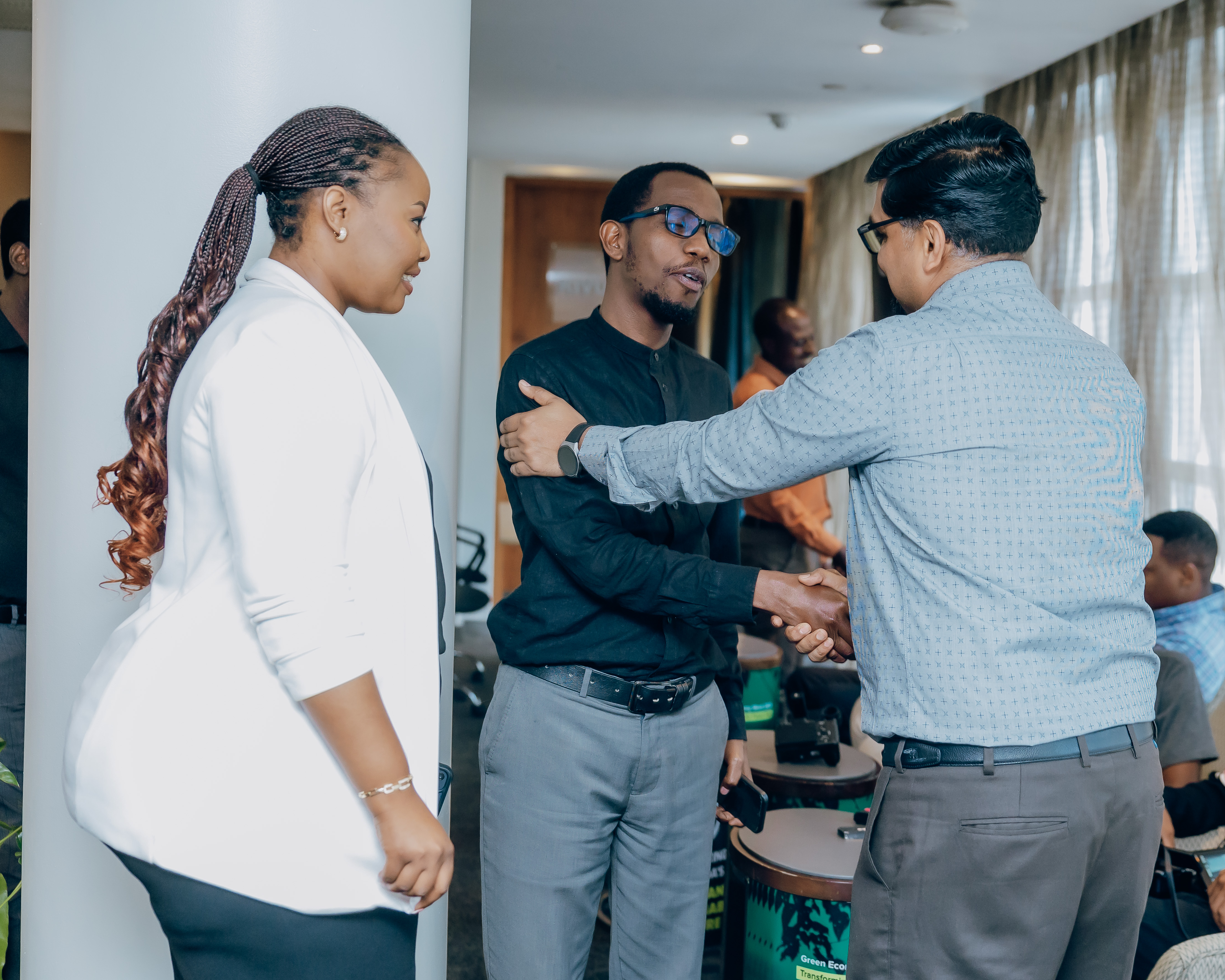 The Computech team interacts with a representative from one of their clients.