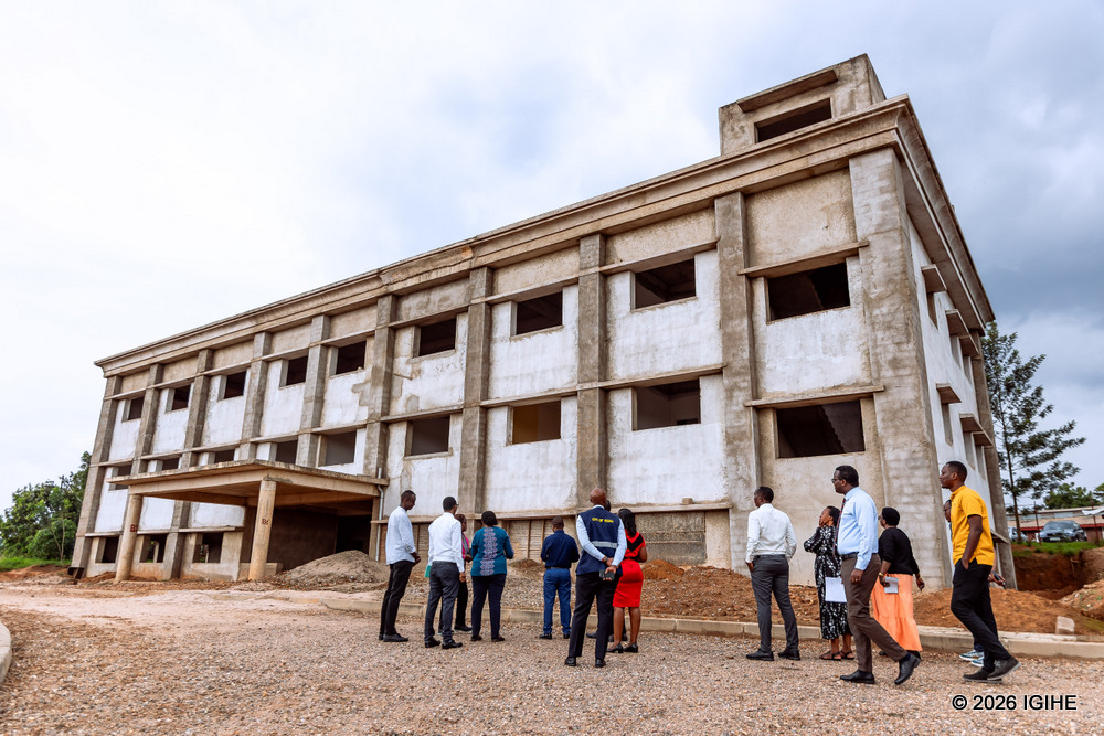 Overall construction is approximately 80% complete, with all major buildings finished.