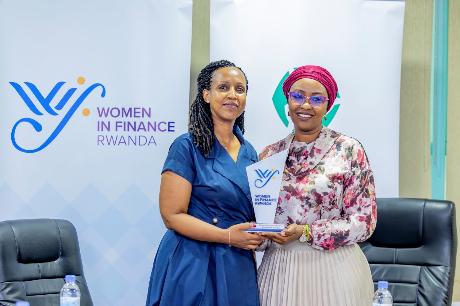 Betty Sayinzoga (left), co-founder of WIFR and Group HR Executive for Sanlam Allianz, presented the membership trophy to Annie Nibishaka, Managing Director of Old Mutual Insurance Rwanda, during the ceremony held on Thursday, March 6, 2025.