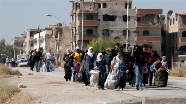 More than 300 people were evacuated from the besieged Damascus suburb of Moadamiyeh on Friday