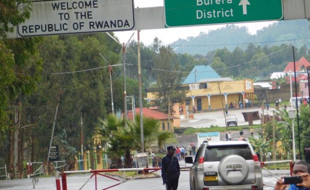A Rwandan security officer inspects a vehicle from the Ugandan side at Cyanika border post. Twelve African countries on Friday resolved to intensify cross-border collaborations to respond, prevent, and control disease outbreaks such as mpox and other health emergencies.