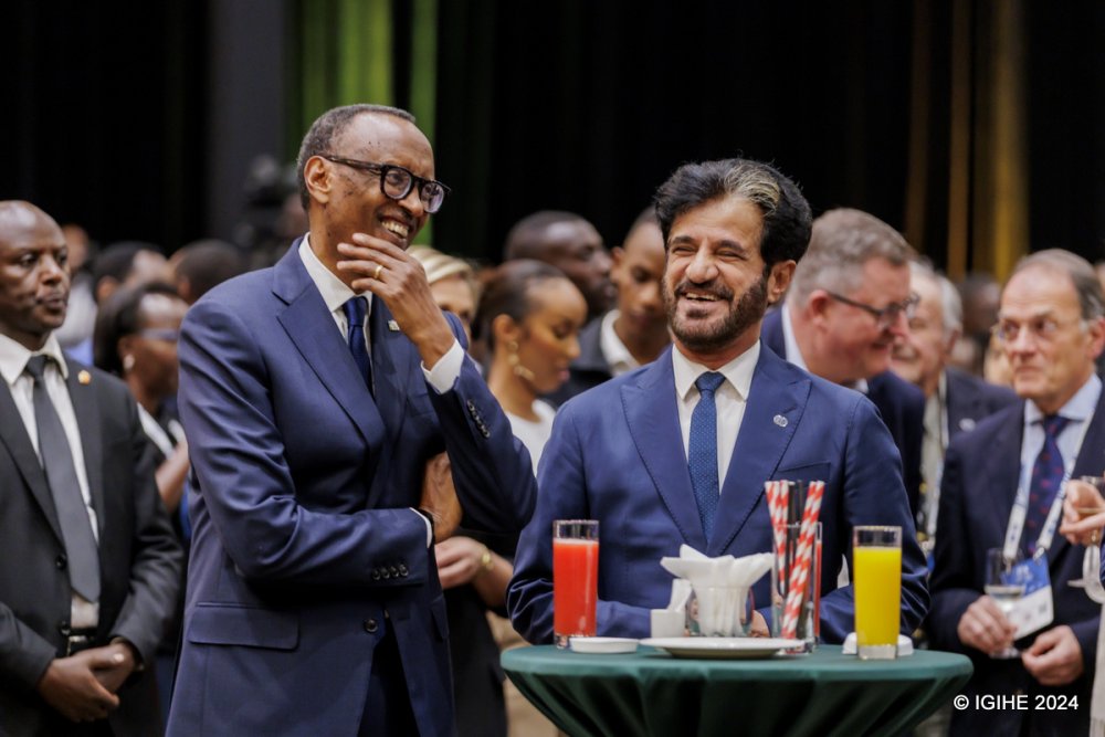 President Paul Kagame shares a light moment with Mohammed Ben Sulayem
