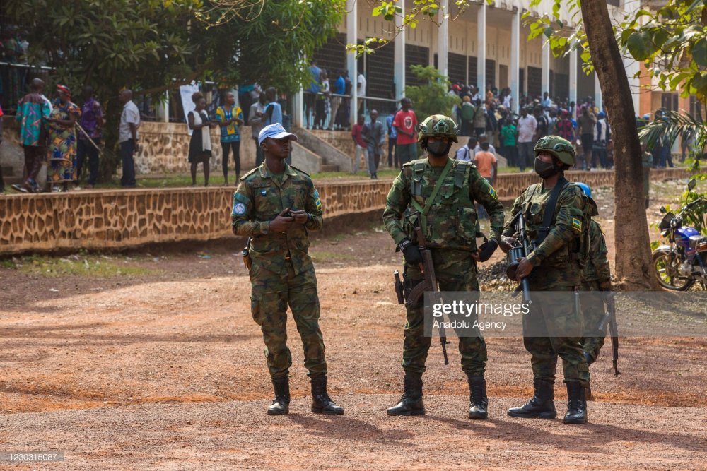 On Election Day, Rwandan troops were deployed on different streets and polling stations in Bangui . 