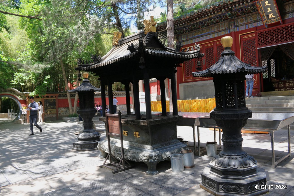 Once a favored pilgrimage site for Qing emperors Kangxi and Qianlong, Tanzhe Temple's grandeur and historical significance remain evident in its sprawling complex.