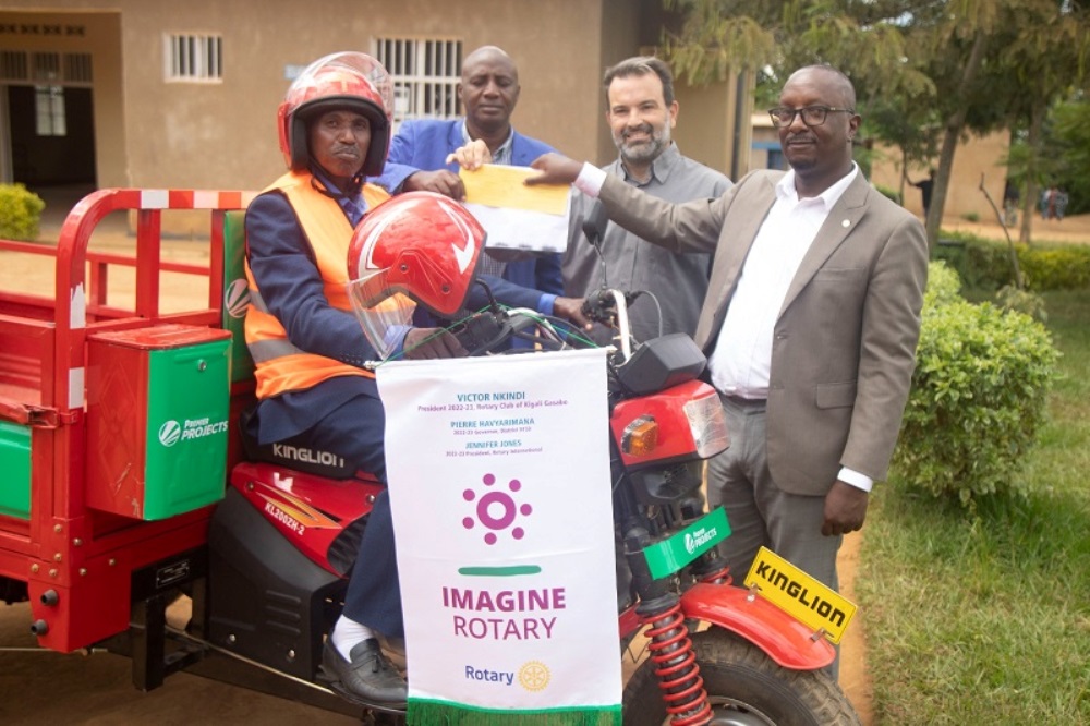 Premier Bet CEO Apostolos Kalodoukas and President of Rotary Club Kigali Gasabo, Victor Nkindi handing over the tri-motorcycle. 