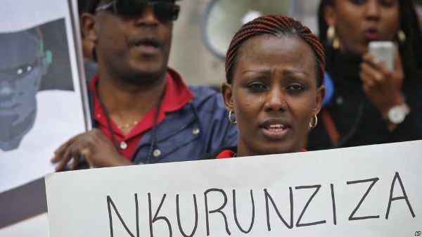 Protesters demonstrate outside U.N. headquarters in New York, calling for an end to political atrocities and human rights violations unfolding in Burundi under the government of President Pierre Nkurunziza, April 26, 2016.