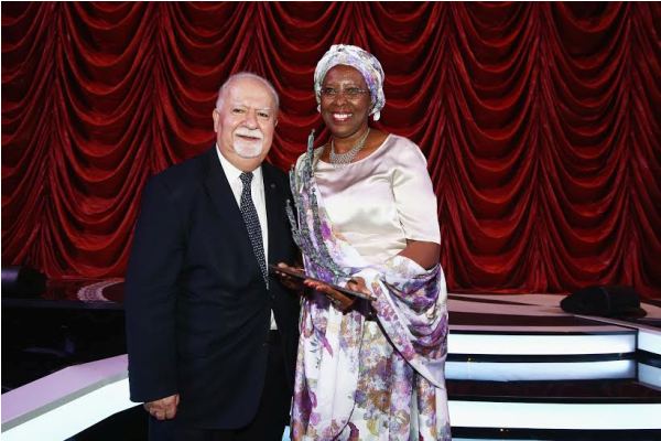 George Clooney, Co-Chair of the Selection Committee, presents the $1 million Aurora Prize to Marguerite Barankitse at ceremony in Yerevan, Armenia