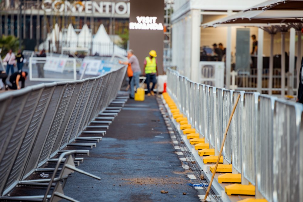 Protective barriers to safeguard riders and fans have been extensively installed.