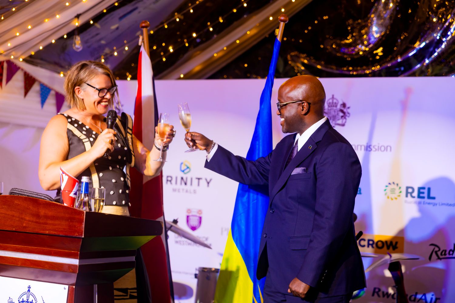 Thorpe and Nduhungirehe toast to celebrate the occasion.