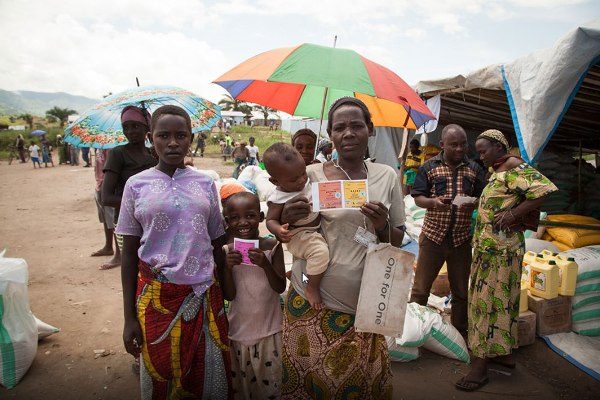 In camp Lucenda, Democratic Republic of the Congo (DRC), Burundian refugees redeem vouchers for food of their choice at food fairs organized by WFP with local merchants.