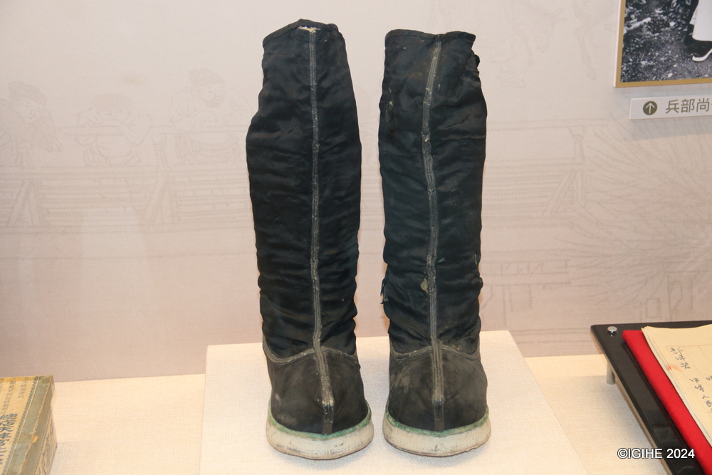 Some of boots displayed inside the small museum at Neiliansheng store.
