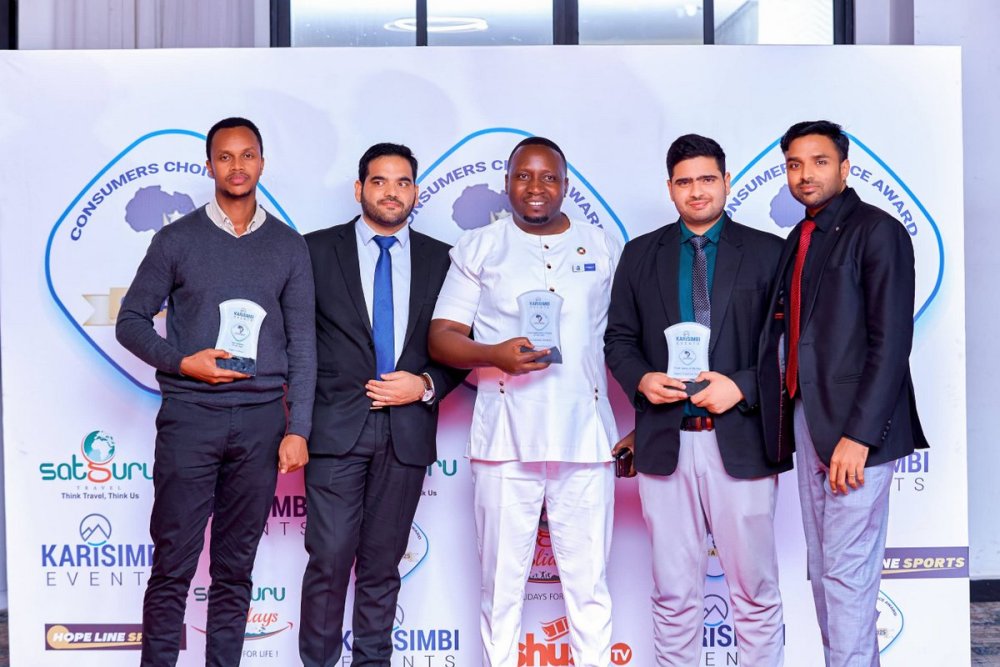 The CEO of Mega Global Market, Dr. Francis Habumugisha (third from the left), alongside other winners of the ‘Consumers Choice Awards’ organised by Karisimbi Events.