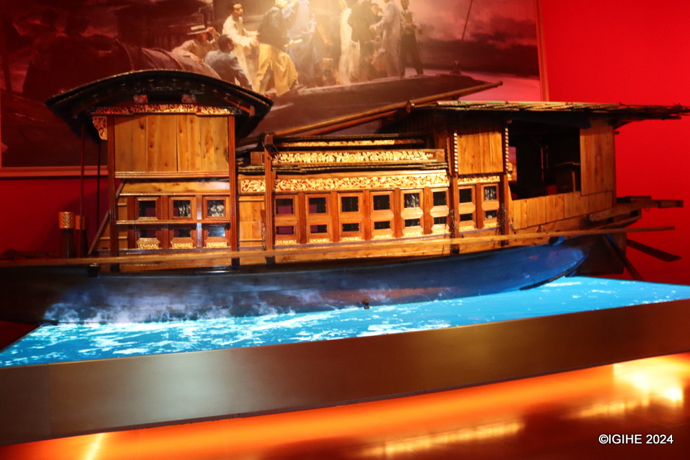 A boat holding great significance in China’s history is seen inside the museum. The First National Congress of the CPC commenced on July 23, 1921, in Shanghai. Despite an initial setback due to a spy's intrusion, which forced the attendees to relocate, the meeting found its unique conclusion on a small boat in Nanhu Lake, Jiaxing.