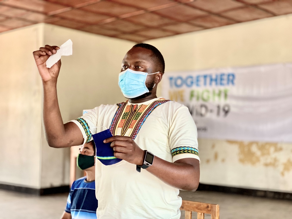 Mr. Steven Ntwali from Africa Uniforms demonstrated the proper way of wearing these masks.