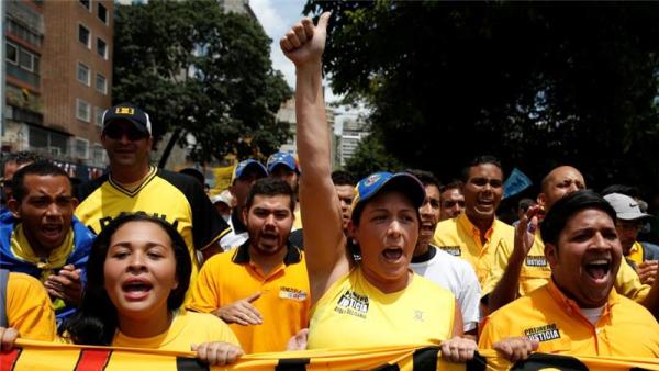 The opposition blames Maduro for an economic implosion that has seen severe food shortages, a healthcare crisis, hyperinflation, violence and looting erupt in Venezuela
