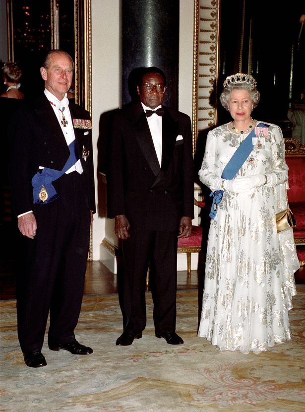 The Queen and Prince Philip with Mugabe during his state visit in May 1994
