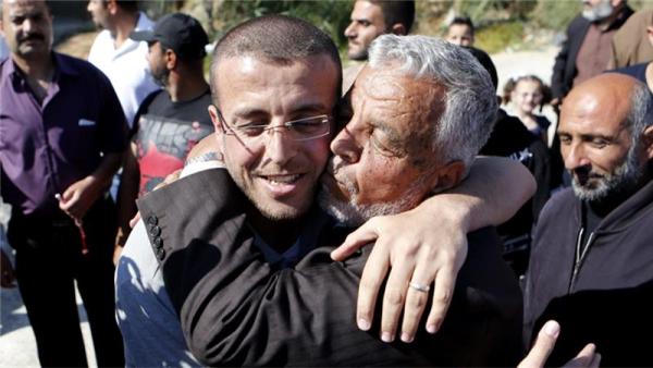 Some say Qeeq, who was freed in the West Bank, was persecuted for his opinion