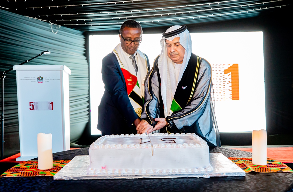 Rwanda's Minister of Foreign of Foreign Affairs, Dr. Vincent Biruta and UAE Ambassador to Rwanda cutting a cake at the celebration of 51st UAE National Union. 