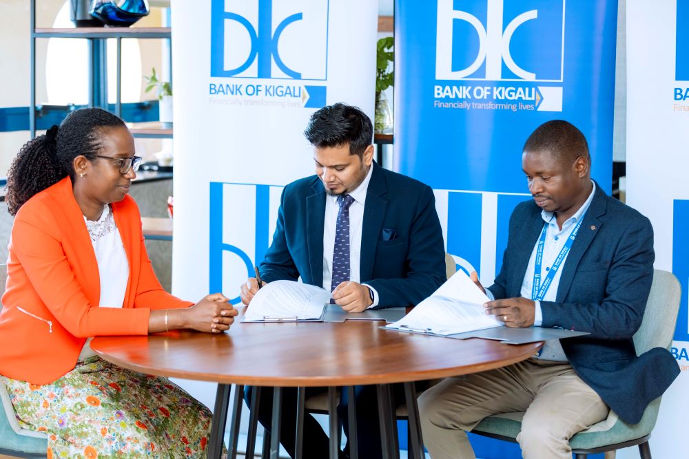 Dr. Diane Karusisi, CEO of Bank of Kigali (left), highlighted the milestone of this partnership, aiming to boost efficiency and transparency in loan processes for their clients.