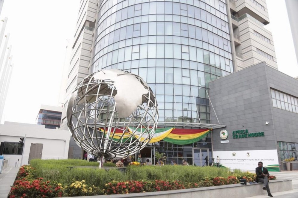A man sits outside the office building of the African Continental Free Trade Area (AfCFTA) Secretariat in Accra, capital of Ghana, Aug. 17, 2020. (Ghana Presidency/Handout via Xinhua)