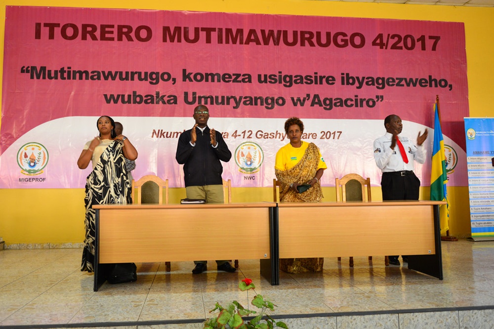 Premier Murekezi Anastase (second from left) with other officials closing women leaders civic education yesterday.