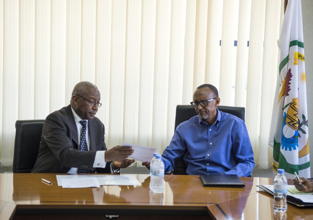 President Paul Kagame presenting his credentials to NEC Chariman,Prof Kalisa Mbanda. 
