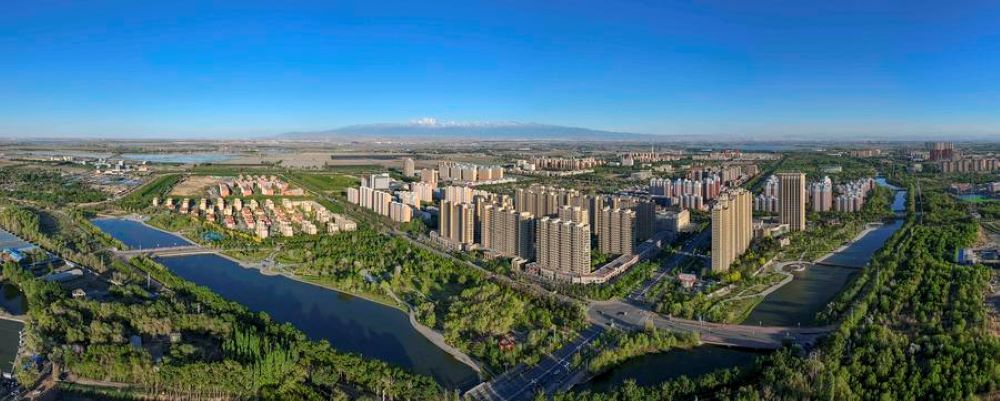 An aerial panoramic drone photo taken on May 9, 2024 shows a city view of Wujiaqu, northwest China's Xinjiang Uygur Autonomous Region. (Xinhua/Hu Huhu)