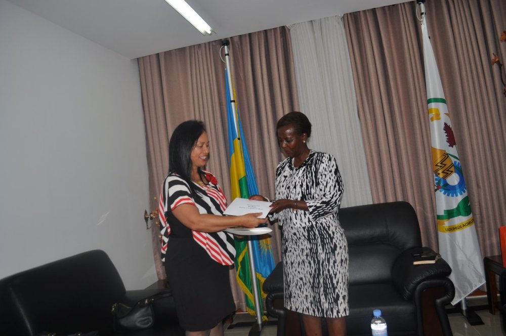 Min. Mushikiwabo receiving copies of credence letters from Columbia's Ambassador in Rwanda; Elizabeth Taylor