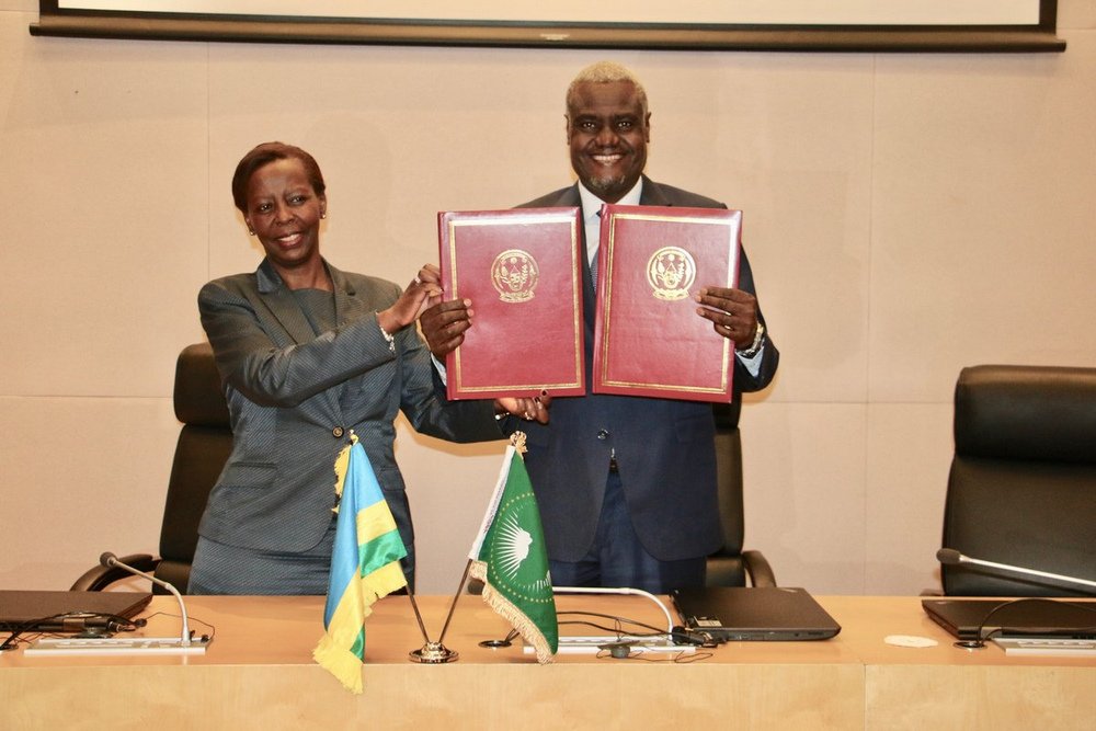 Mushikiwabo presents the ratification instruments to AUC Chairperson Moussa Faki Mahamat yesterday in Ethiopia