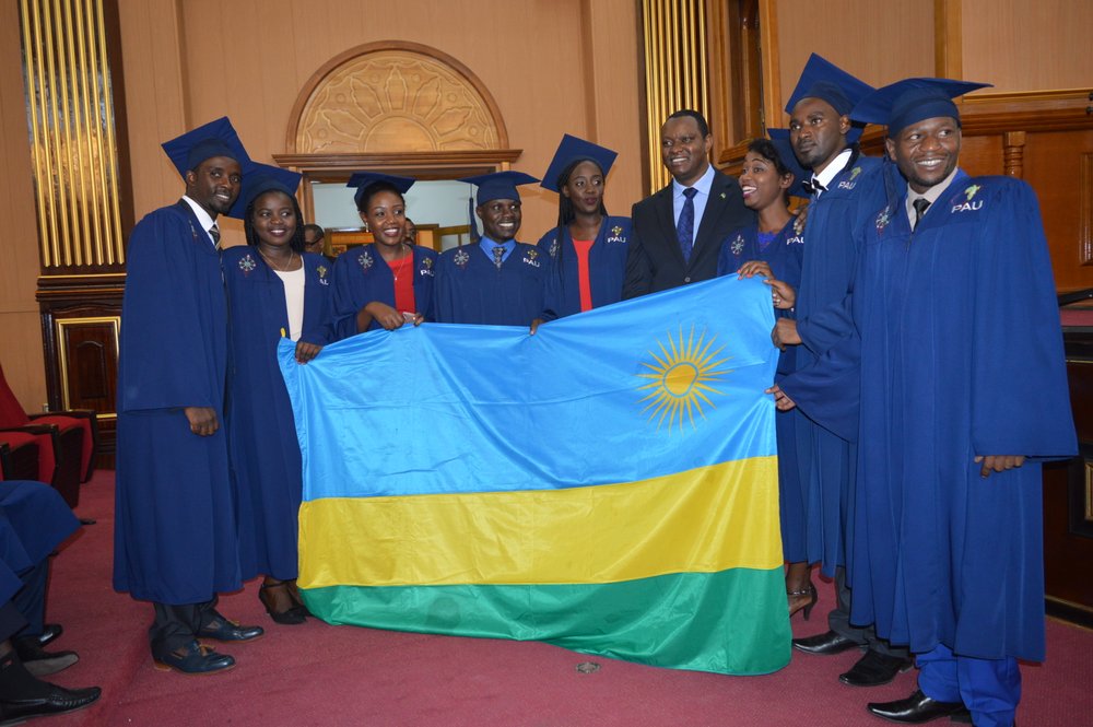 The 8 graduates from PAUWES with Mr Eric Kayoge Rutoni, the Counsellor and Deputy Head of the Mission