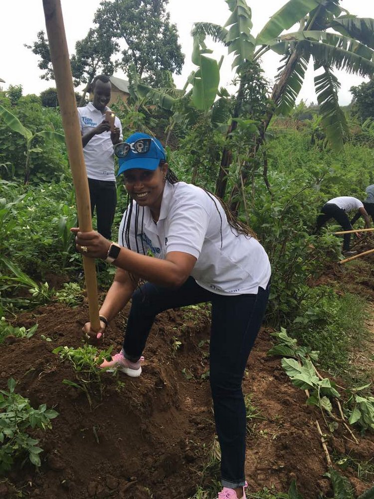 Tigo Deputy CEO, Chantal Kagame at work with her collegues