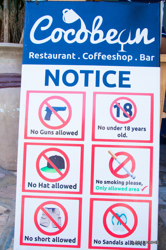 Cocobean's front entry is adorned with a notice board that show the club's regulations