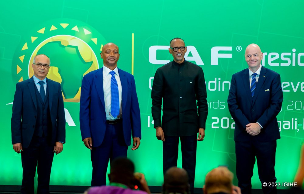 President Kagame, and Minister of Education and Sports in Morocco, Chakib Benmoussa (left); CAF President, Patrice Motsepe and FIFA President, Gianni Infantino in a group photo.