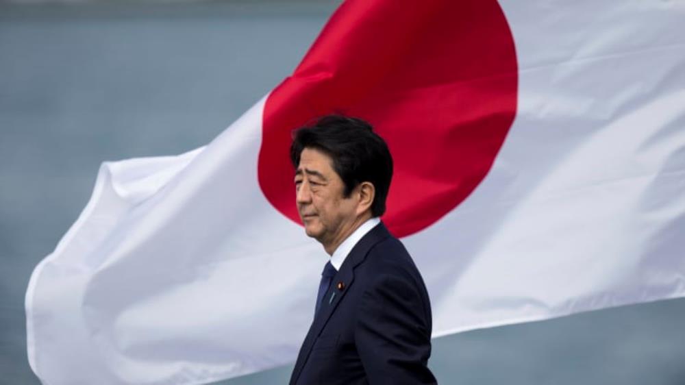 This 2016 photo shows then-Japanese Prime Minister Shinzo Abe at Joint Base Pearl Harbor Hickam’s Kilo Pier in Honolulu, Hawaii. Kent Nishimura | Getty Images