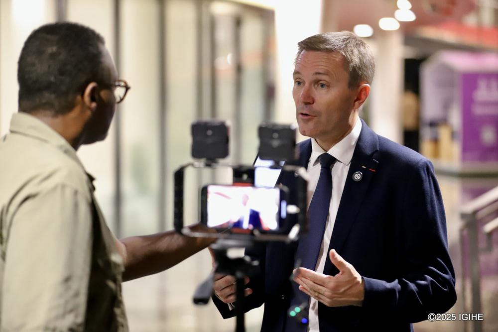 David Lappartient, President of the Union Cycliste Internationale, speaking with an IGIHE journalist after the end of the Road World Cycling Championships in Kigali, Rwanda.