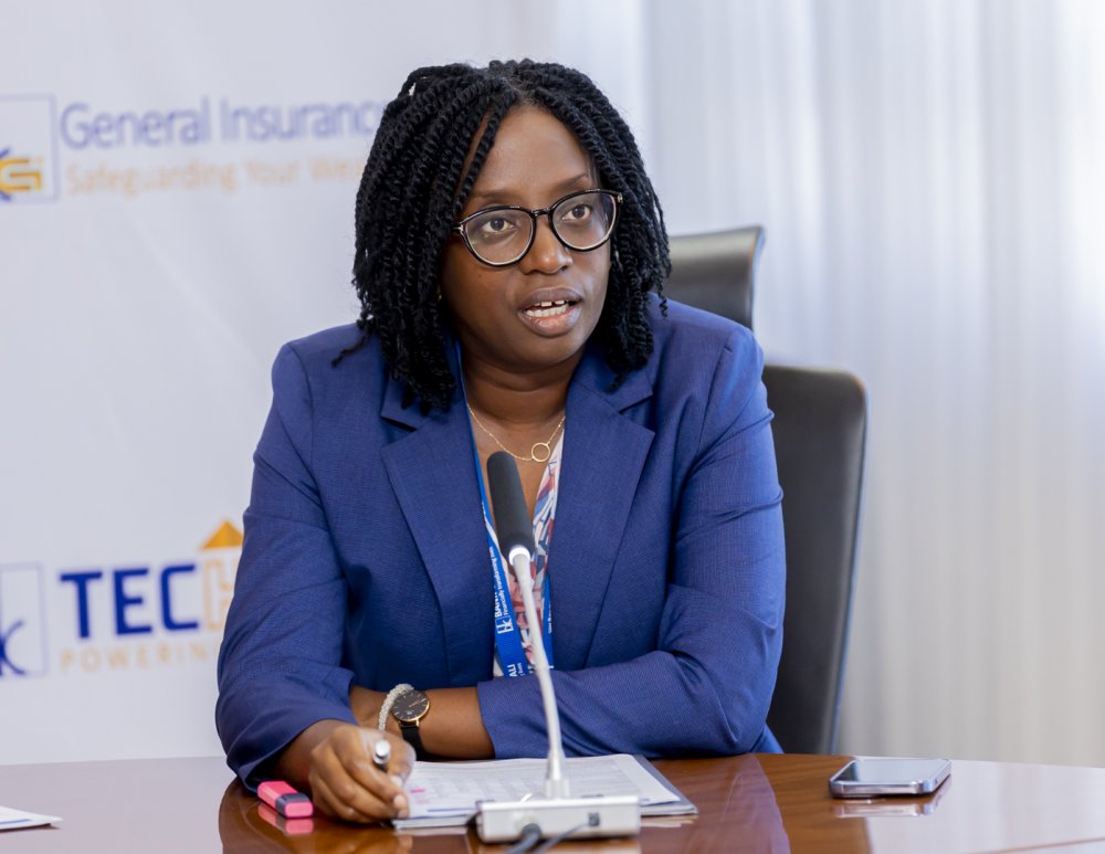 The CEO of Bank of Kigali, Dr. Diane Karusisi announcing the lender's performance for the first half of 2022. 