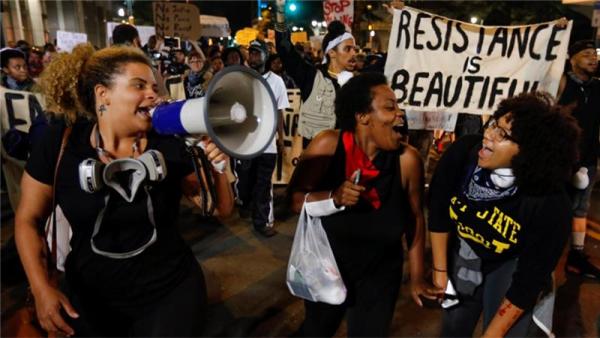 Protesters are outraged over the police killing of Keith Lamont Scott, a 43-year-old father