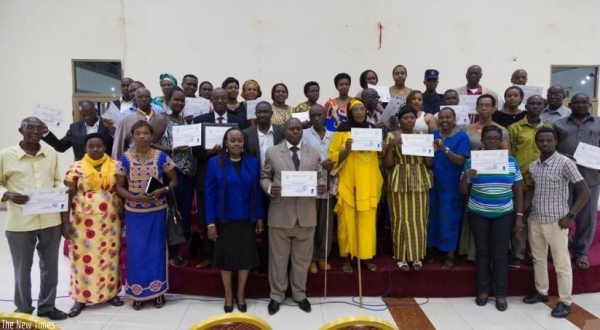 Members of community mediators (Abunzi) commitees pose for a group photo in Kimironko.