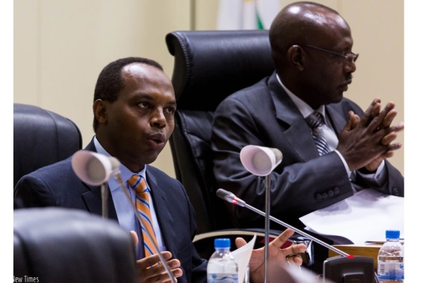 RDB chief executive Francis Gatare (L) addresses Parliament's Chamber of Deputies yesterday as Deputy Speaker, Abbas Mukama, looks on.