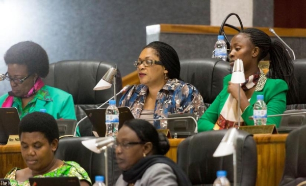 Members of Parliament follow proceedings at the Lower House yesterday.
