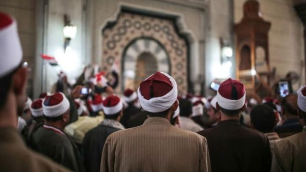 In this Feb. 3, 2015 file photo, Egyptian clerics from Al-Azhar institution rally to denounce terrorism and show solidarity with the Egyptian government and security forces at a mosque in central, Cairo, Egypt. In July 2016 the Egyptian government launched a radical bid to establish control over Egypt’s religious discourse, mandating that all imams at all mosques across the country read pre-written sermons distributed by the ministry. The government describes the initiative, unprecedented in Egypt’s history, as a means of weeding out extremist ideology, but it has proved extremely unpopular, with critics accusing the state of stifling the freedom of thought and creativity of the clerics.