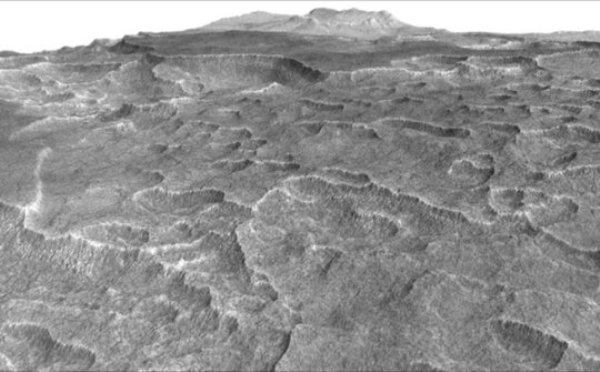 This vertically exaggerated view shows scalloped depressions in a part of Mars where such textures prompted researchers to check for buried ice, using ground-penetrating radar aboard NASA's Mars Reconnaissance Orbiter.