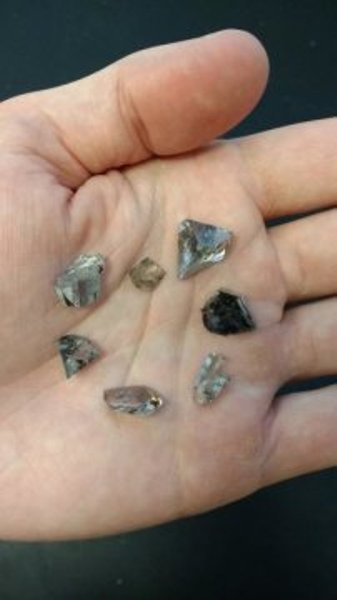 This is an assortment of diamond offcuts used in the study. The largest is 9.6 carats. These diamonds could be analyzed by destructive means (polishing to expose inclusions) whereas many other diamonds studied were polished gemstones that were only borrowed and studied non-destructively.