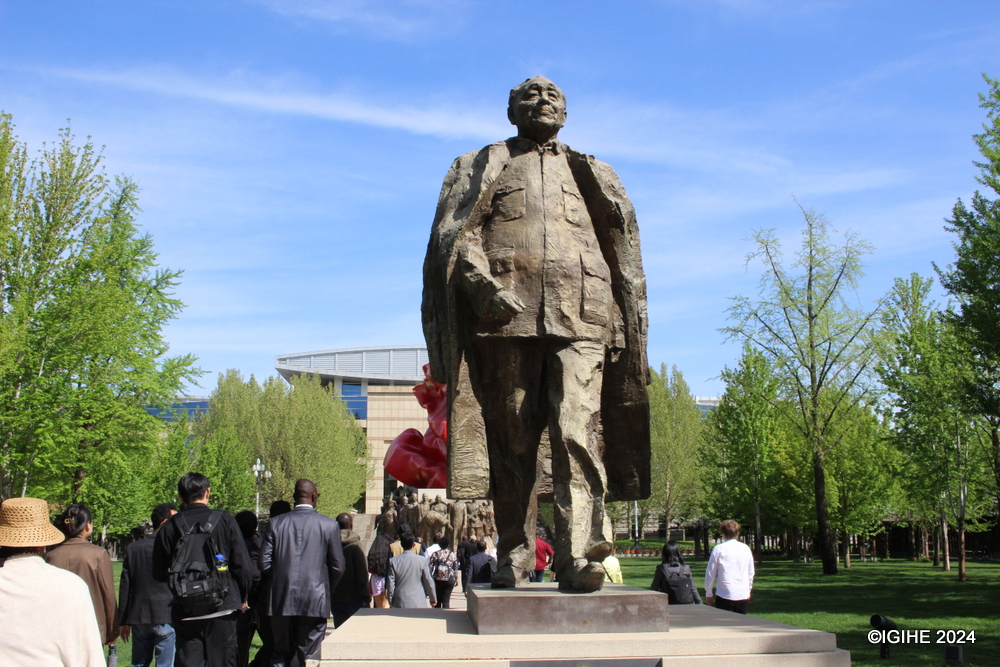 A statue of Deng Xiaoping, hailed as the Chief Designer, stands prominently in the square before the auditorium. This statue pays homage to Deng's transformative leadership in modernizing China and guiding its emergence as a global power.