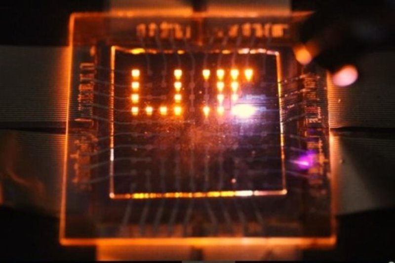 A laser stylus writes on a small array of multifunction pixels made by dual-function LEDs than can both emit and respond to light.