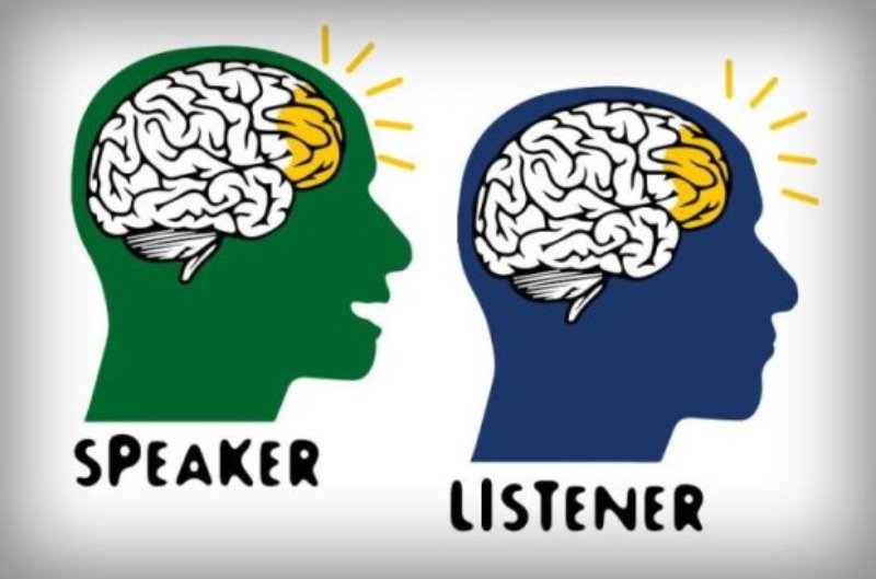 This is a cartoon image of brain 'coupling' during communication.