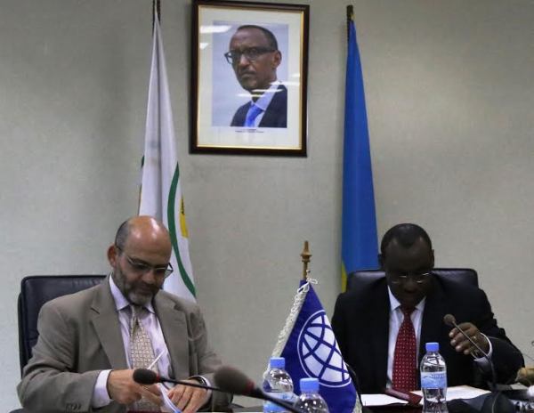 The Minister of Finance and Economic Planning, Claver Gatete and the World Bank Country Manager, Yasser El-Gamal signing agreements