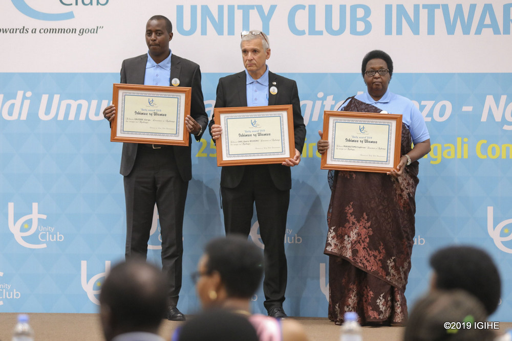 Daphrose Mukarutamu, Serge Gasore and Carl Wilkens were awarded for their outstanding work in society